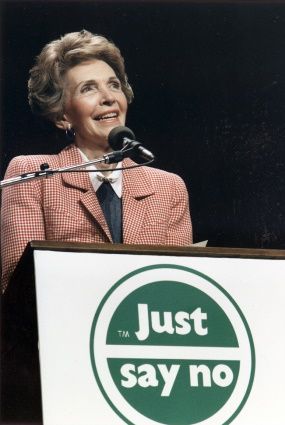 Nancy Reagan speaking in front of a "Just say no" podium.